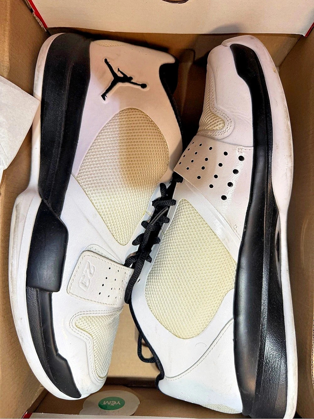Jordan Air Jordan 4 Sneakers in White & Black